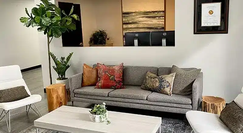Calming lounge with meditation décor at The Grove — sound and mindfulness programming.